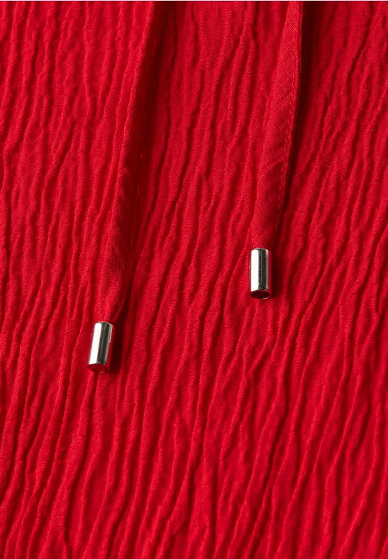 Túnica texturizada con cinta