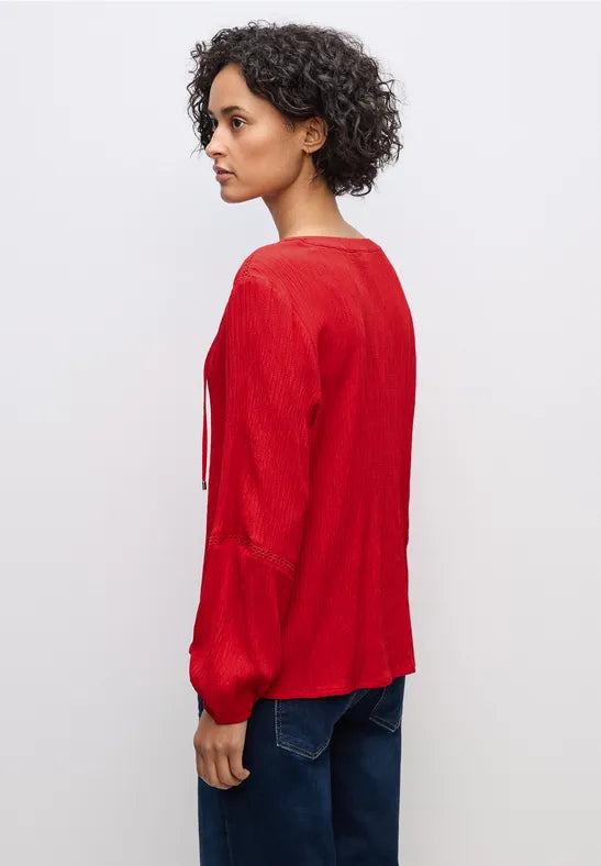 Túnica texturizada con cinta