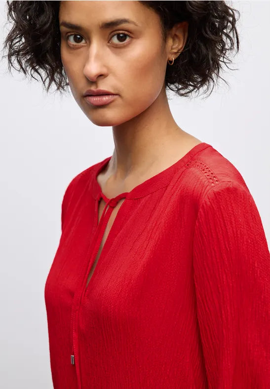 Túnica texturizada con cinta