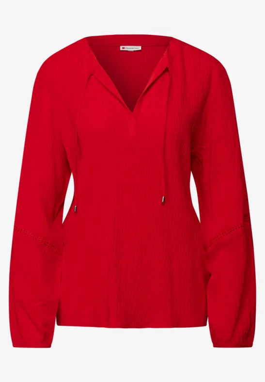 Túnica texturizada con cinta